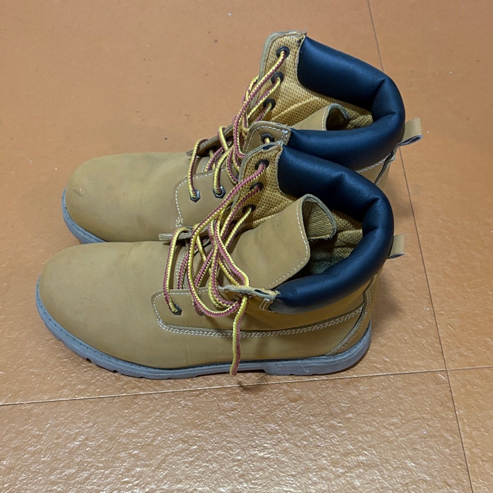 George Tan and Black Lace-Up Boots